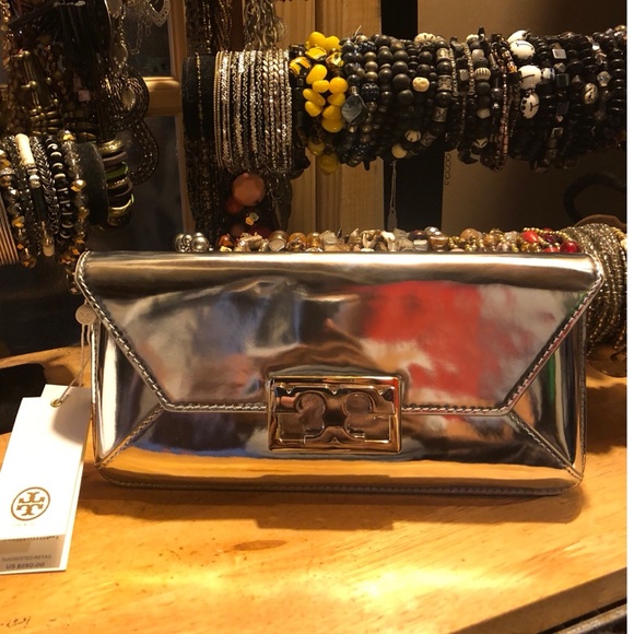 Tory Burch Handbags - Tory Burch Metallic Leather Clutch.